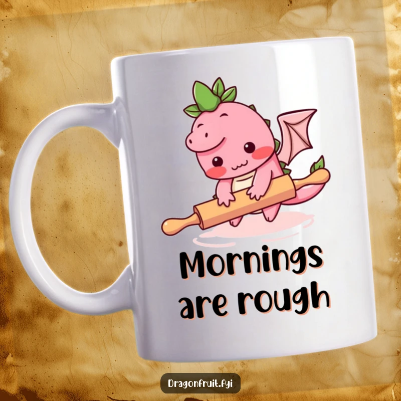 Funny mug featuring a blushing dragonfruit character comically tripping over a rolling pin, a sweet kitchen mishap.