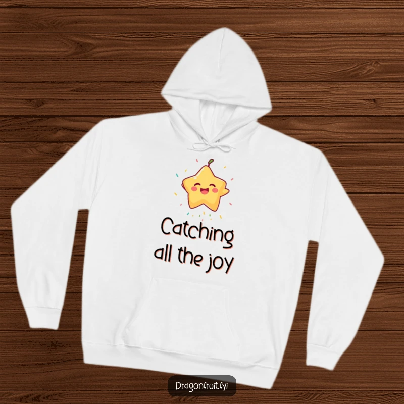 Funny Starfruit Hoodie: A laughing starfruit gleefully attempts to catch sprinkles, offering comfort and humorous charm.