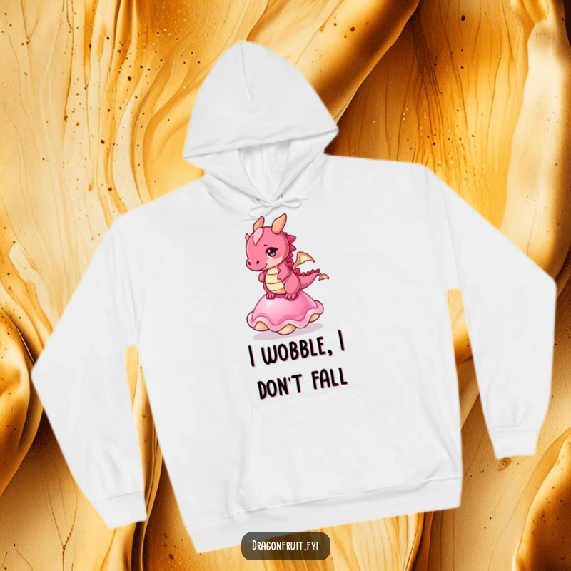 Funny hoodie: a cute dragonfruit character wobbling precariously on a jelly, illustrating a moment of funny chaos.