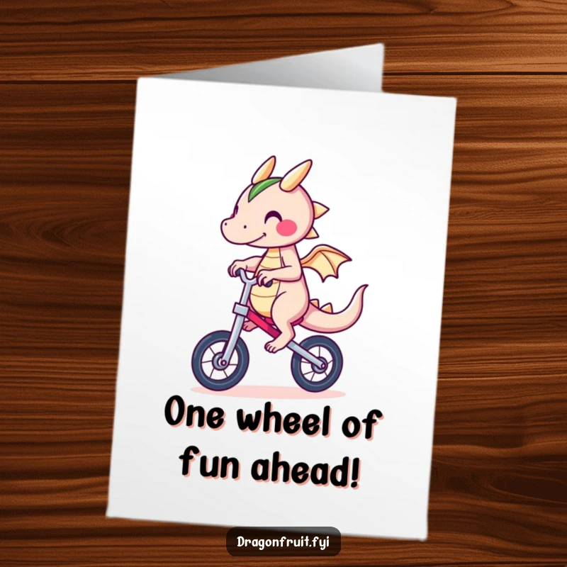 Funny free printable birthday card: a dragonfruit character struggling hilariously to balance on a unicycle.