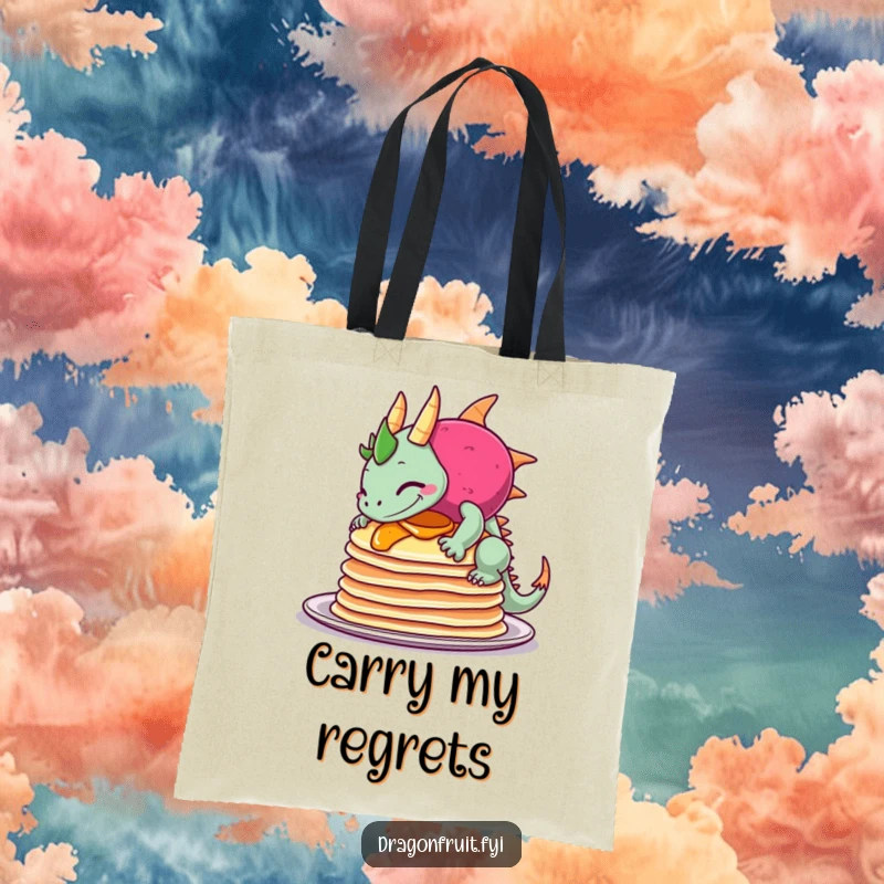 Funny tote bag depicting a dragonfruit comically tripping over pancakes with a sheepish expression, highlighting a humorous food-related incident.