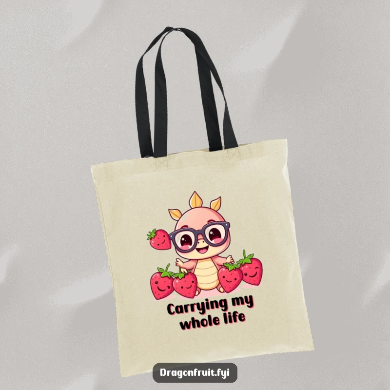 Funny tote bag showcasing a tiny smiling dragonfruit with large glasses, juggling bright red strawberries, ideal for daily use.