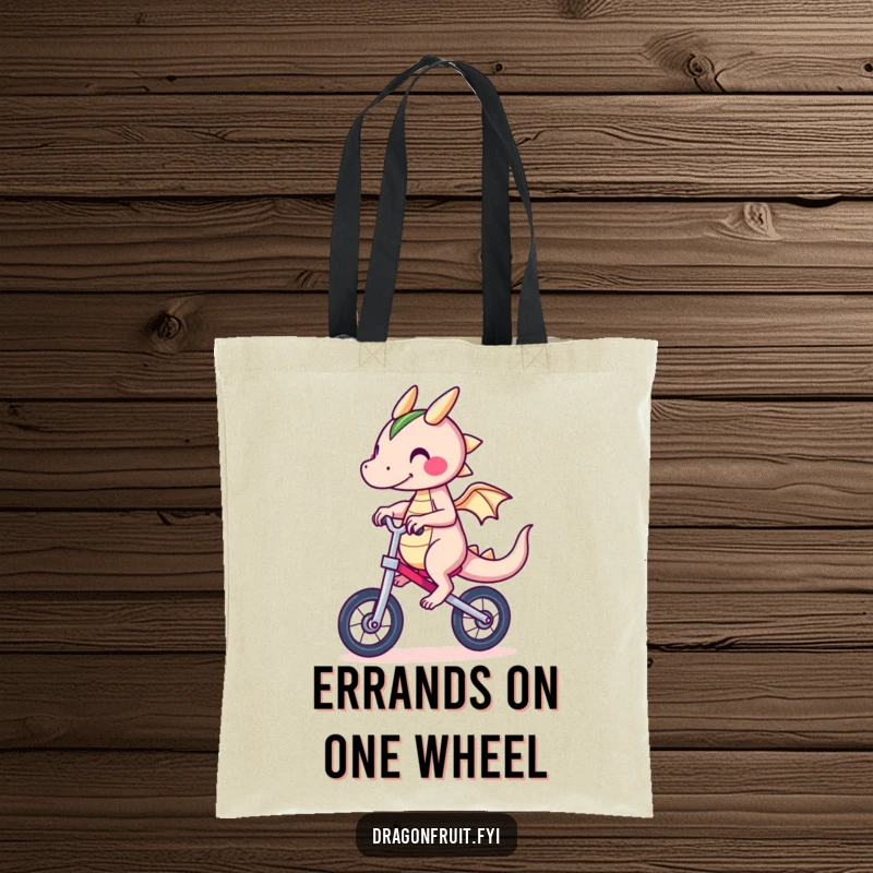 Funny Dragonfruit Tote Bag showcasing a character in a precarious unicycle ride, a humorous accessory for daily use.